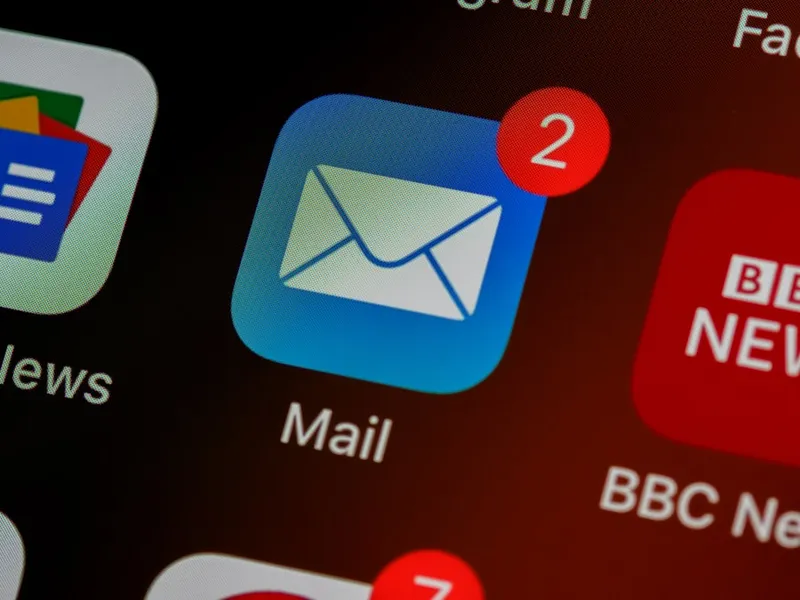 An email inbox on a laptop screen — where your follow-up needs to stand out