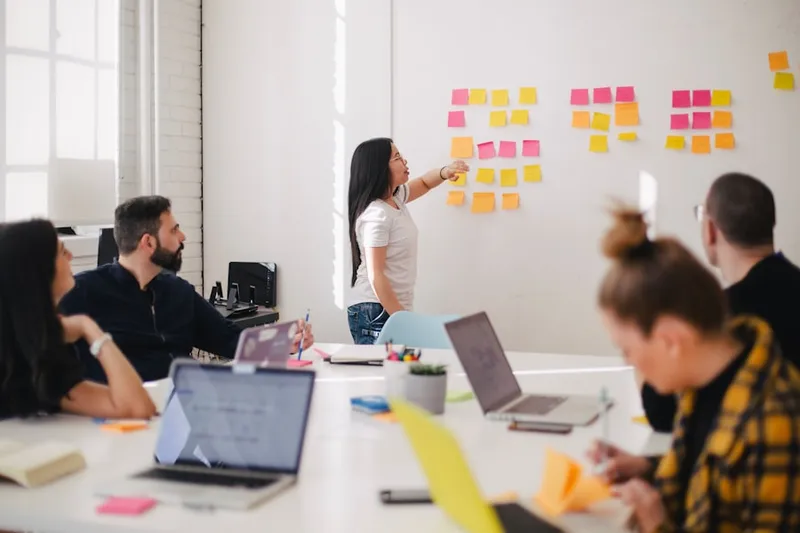 A sales team reviewing leads together after a trade show